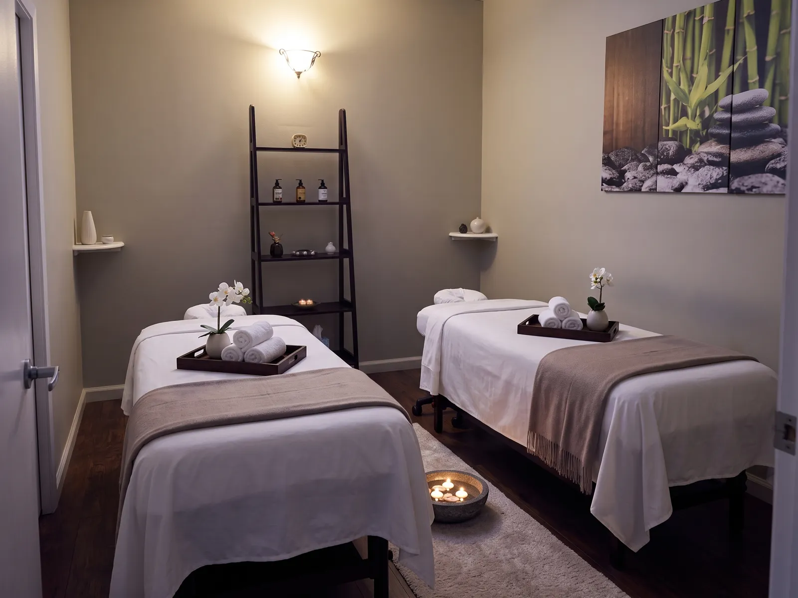 The couples room at JJ Spa seen from the doorway, both tables made and lit by candles